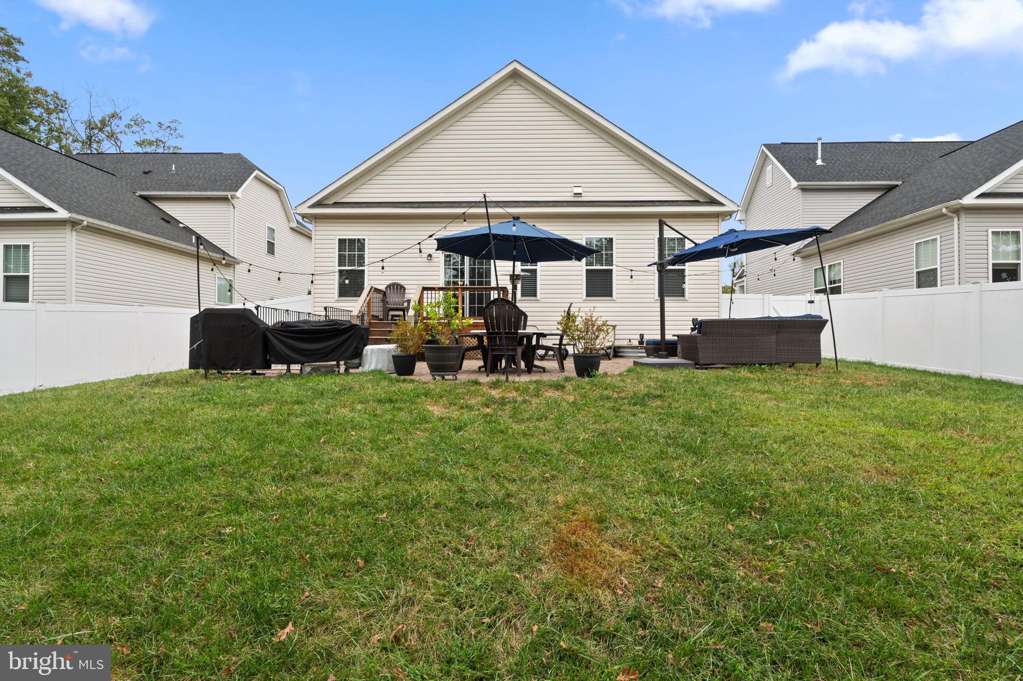 12203 Aster Road Bristow, VA 20136 - Photo 45 of 55 Charming backyard oasis with cozy seating.