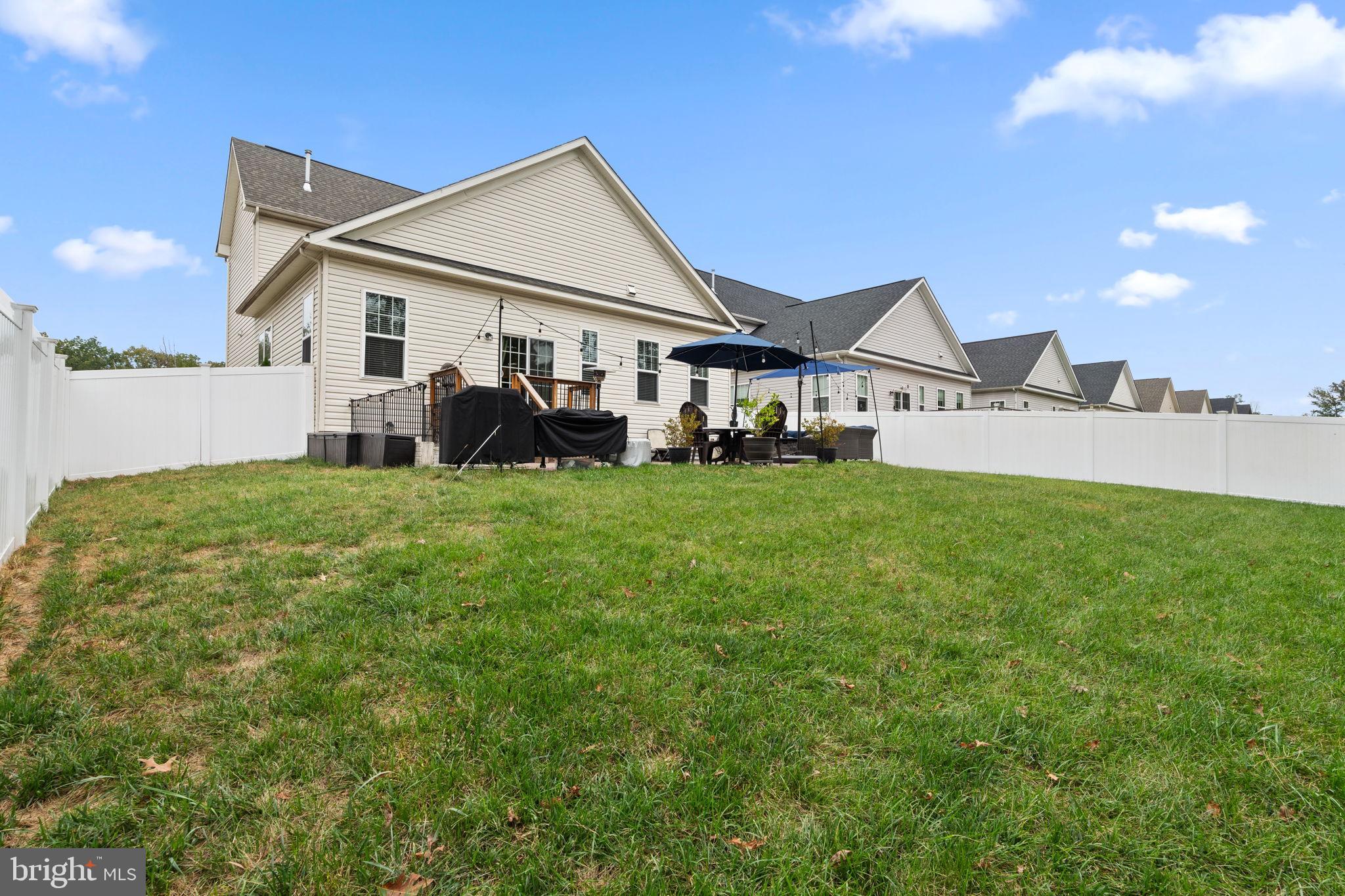 12203 Aster Road Bristow, VA 20136 - Photo 46 of 55 Spacious backyard oasis with serene views.