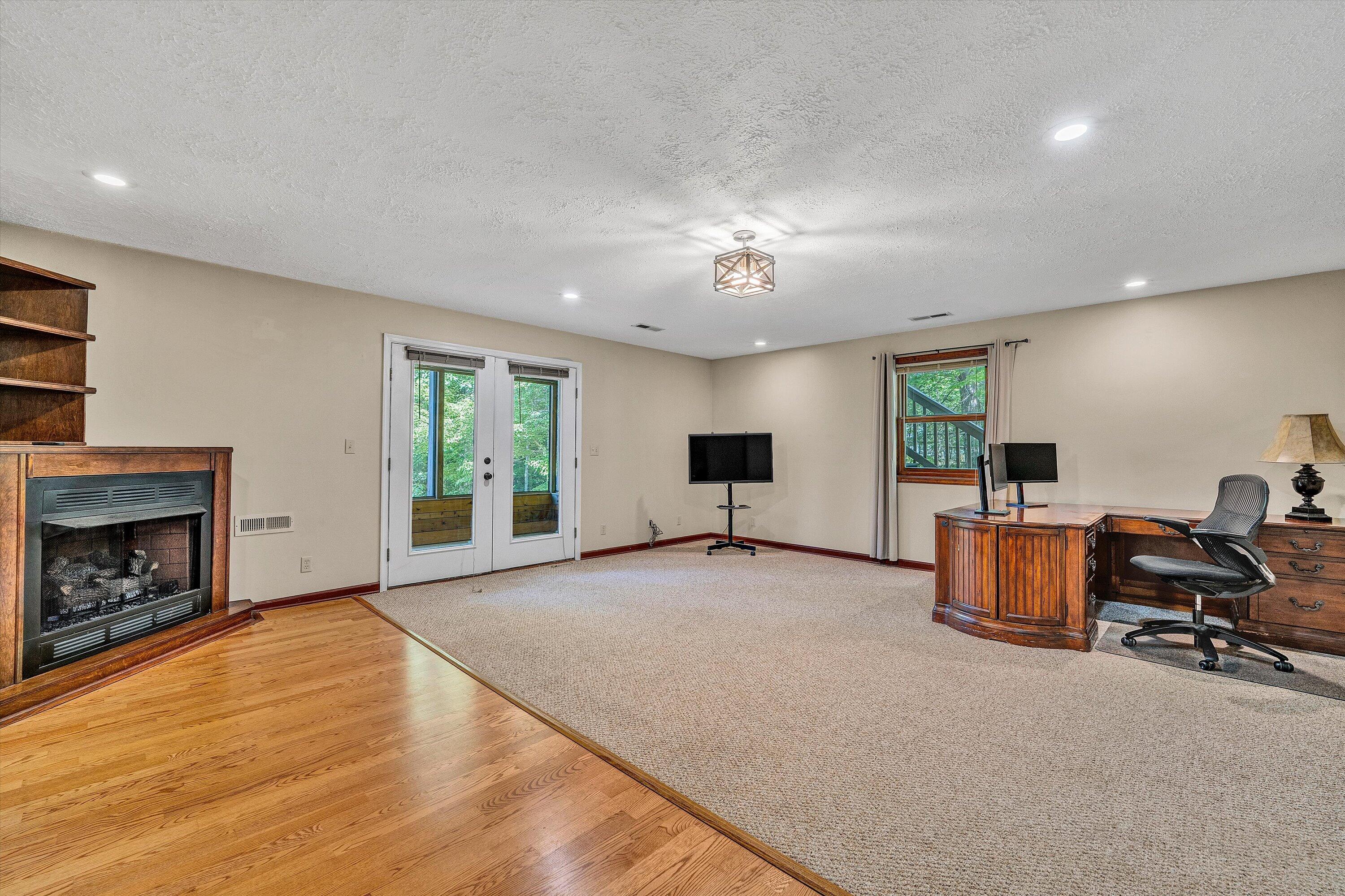 400 Harbor Moneta, VA 24121 - Photo 29 of 51 a living room with furniture and a fireplace