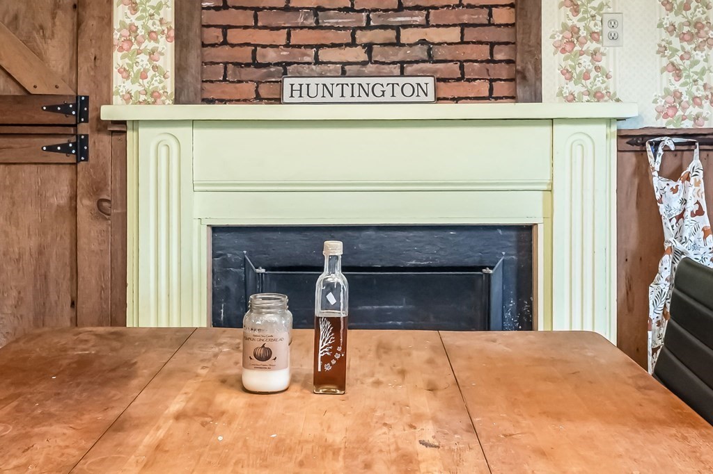79 Worthington Road Huntington, MA 01050 - Photo 17 of 42 a kitchen with a fireplace and a window