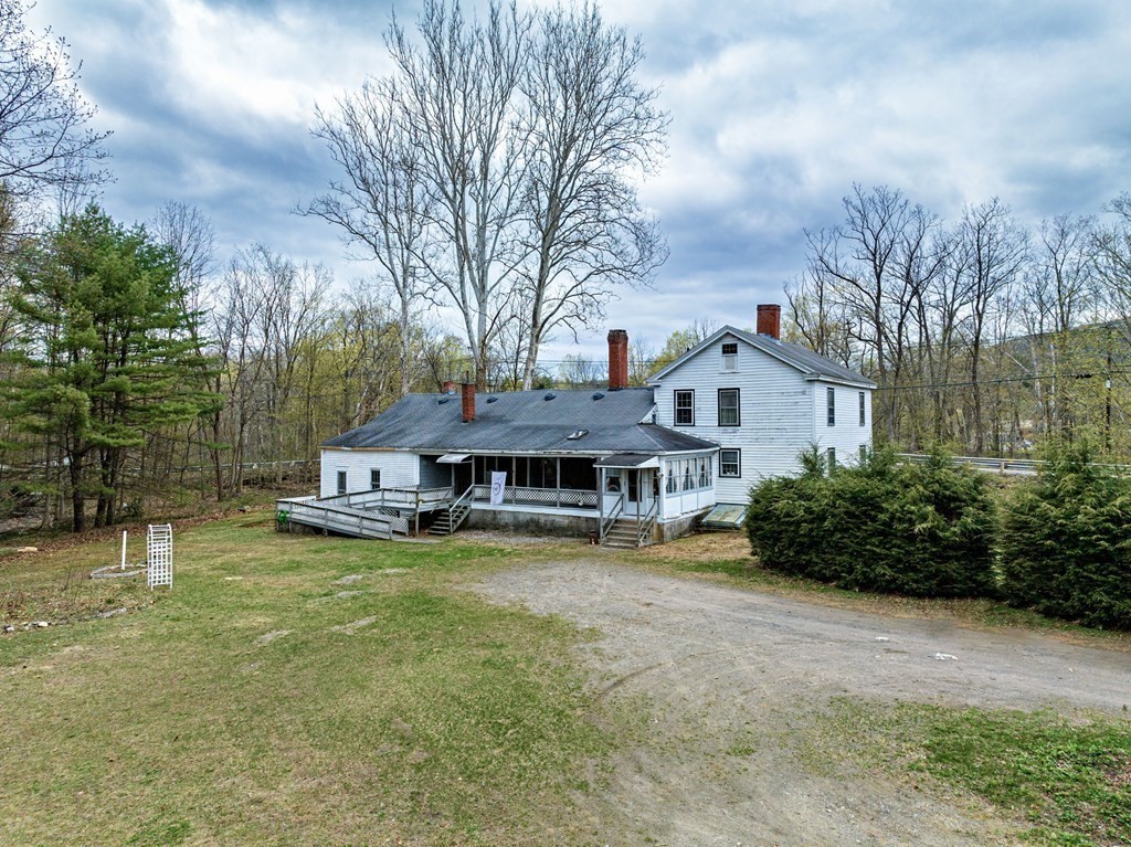 79 Worthington Road Huntington, MA 01050 - Photo 2 of 42 a view of a house with pool and sitting area