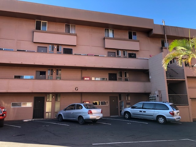 3676 Lower Honoapiilani Road, Unit G203 Lahaina, HI 96761 - Photo 6 of 14 a car parked in front of a building