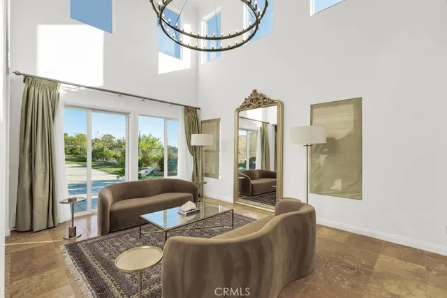 a bathroom with a double vanity sink toilet and shower