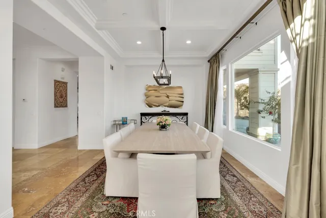 a bedroom with a bed lamp and window