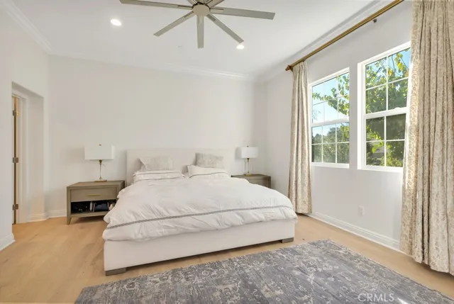 a bedroom with a bed and a fireplace