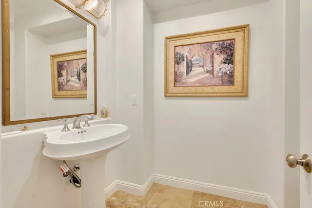 a bedroom with a bed and a fireplace