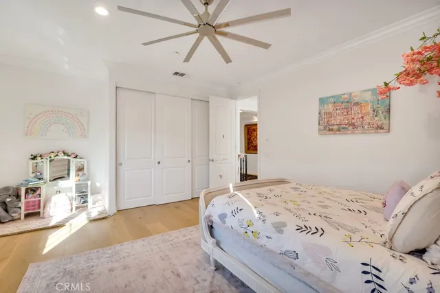 a spacious bathroom with a granite countertop sink mirror and bathtub