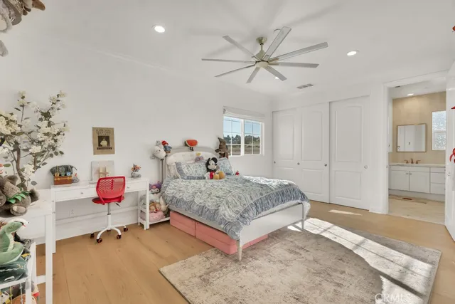 a view of a street with a building in the background