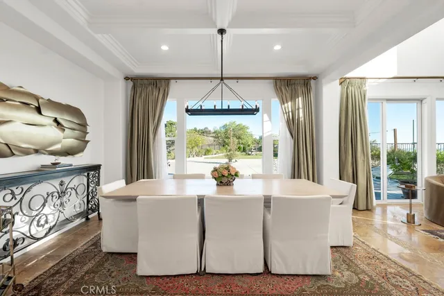 a kitchen with a sink a stove and cabinets