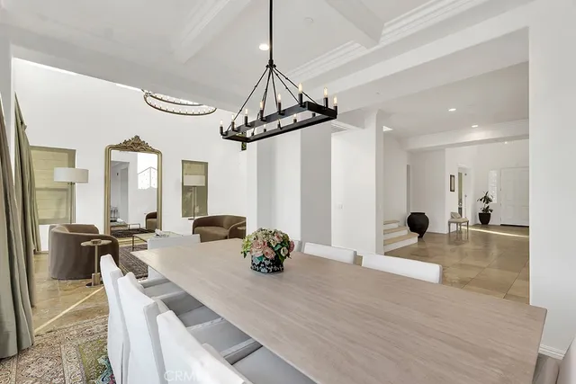 a kitchen with a stove a sink and a refrigerator