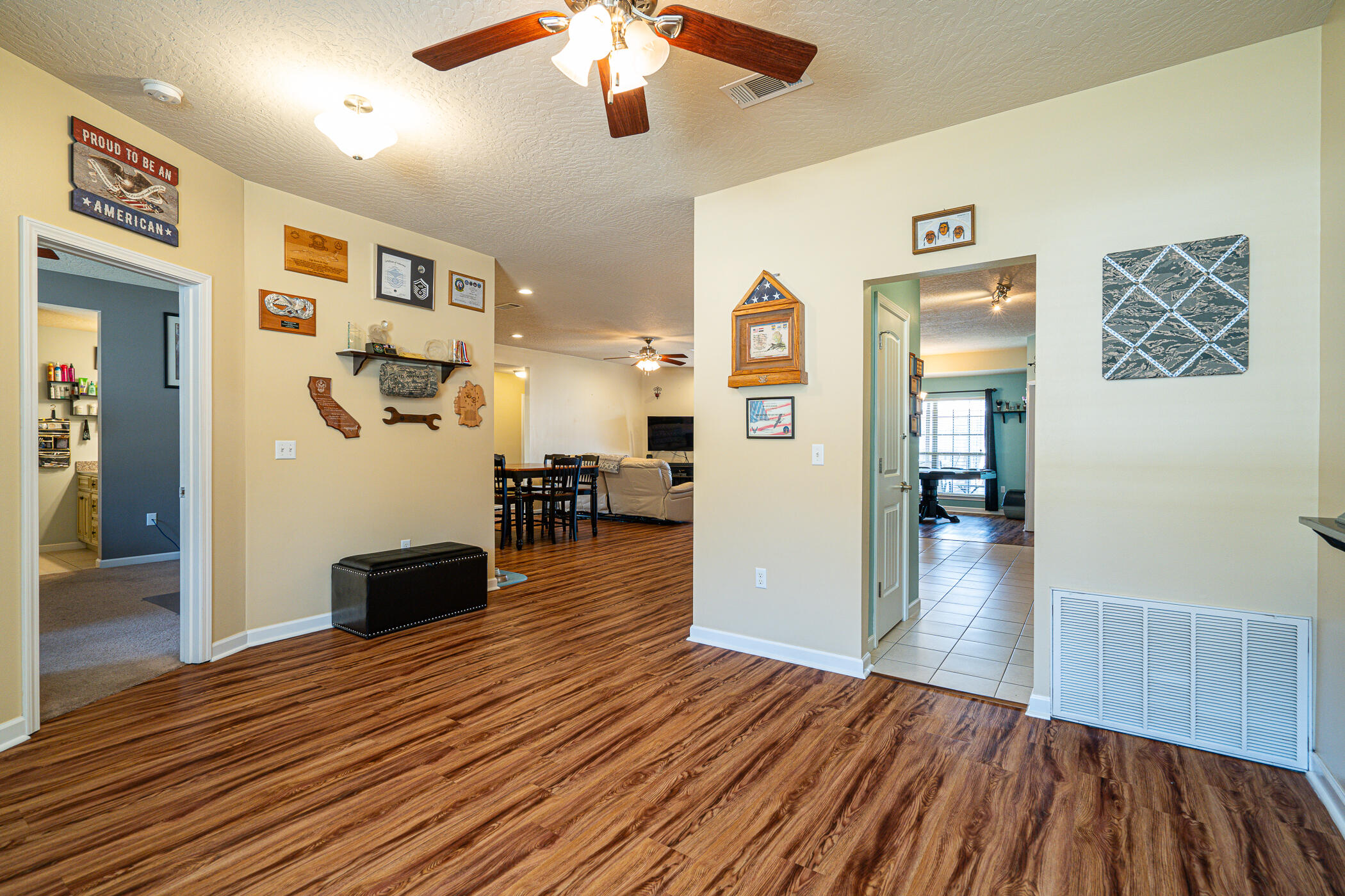 5269 Moore Loop Crestview, FL 32536 - Photo 12 of 36 a view of a livingroom with wooden floor