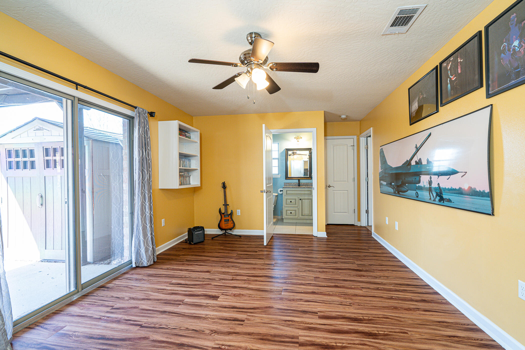 5269 Moore Loop Crestview, FL 32536 - Photo 23 of 36 a view of an entryway with wooden floor
