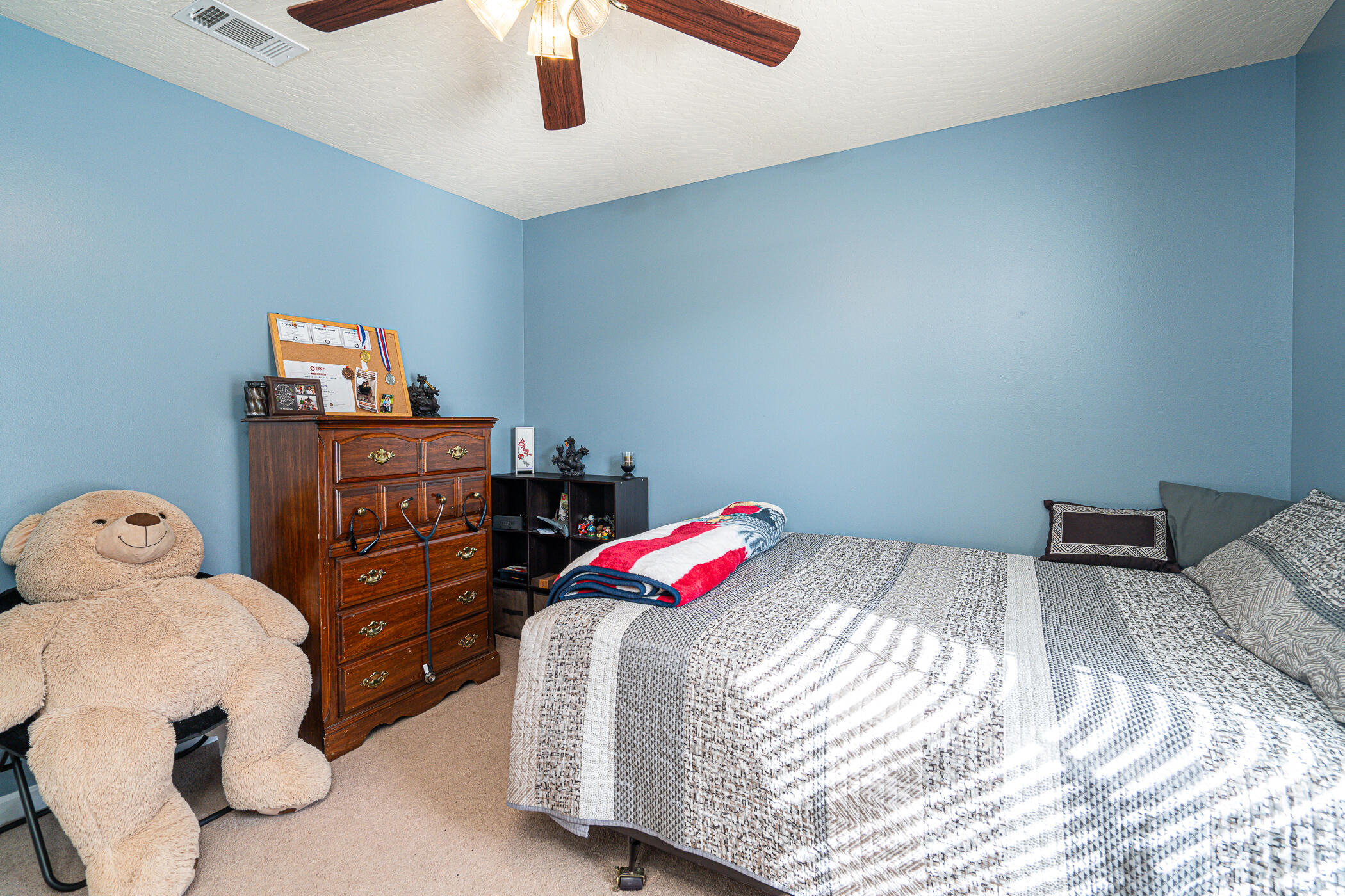 5269 Moore Loop Crestview, FL 32536 - Photo 26 of 36 a bedroom with a bed and a lamp
