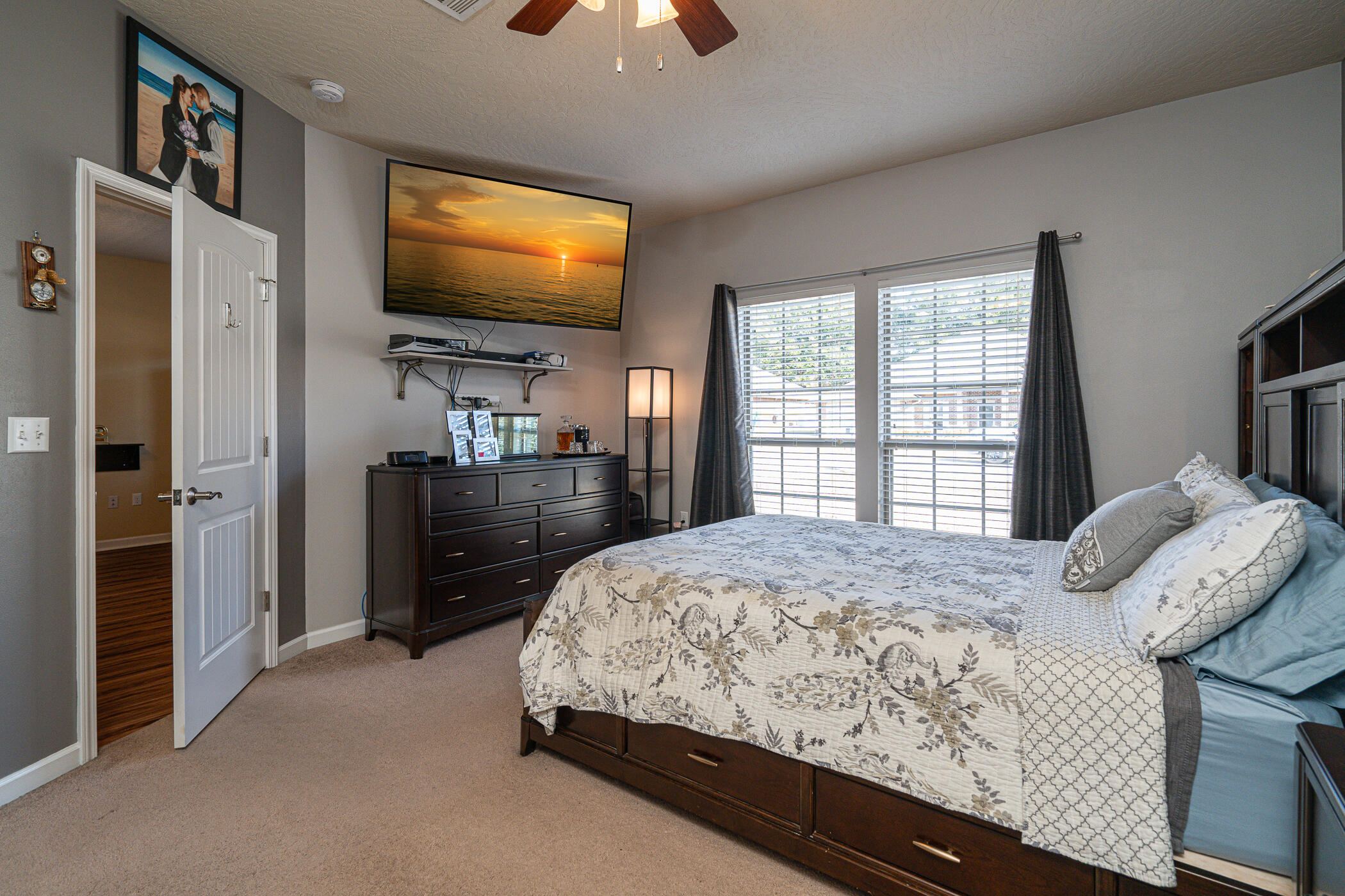 5269 Moore Loop Crestview, FL 32536 - Photo 29 of 36 a bedroom with a bed and a flat screen tv