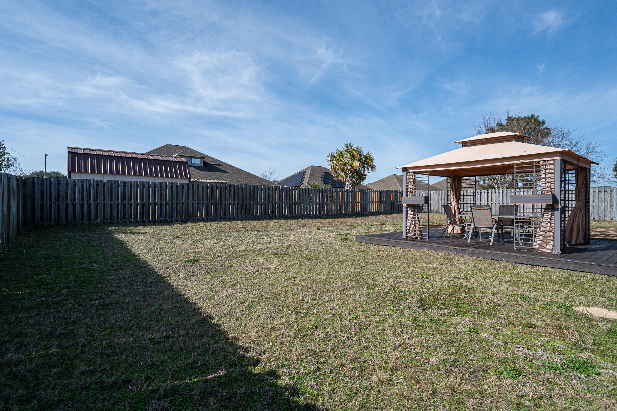 5269 Moore Loop Crestview, FL 32536 - Photo 34 of 36 a view of a house with a yard