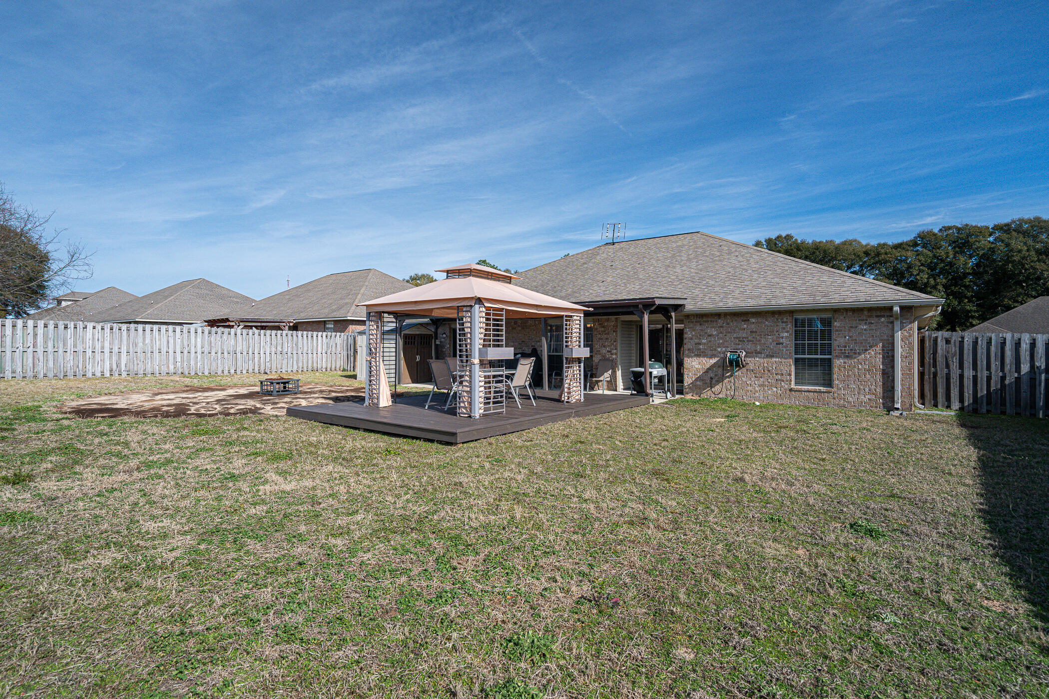 5269 Moore Loop Crestview, FL 32536 - Photo 35 of 36 a front view of a house with garden