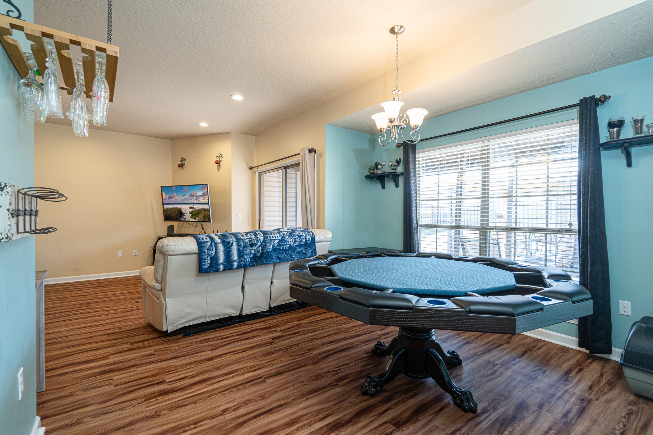 5269 Moore Loop Crestview, FL 32536 - Photo 10 of 36 a living room with furniture a table and a large window