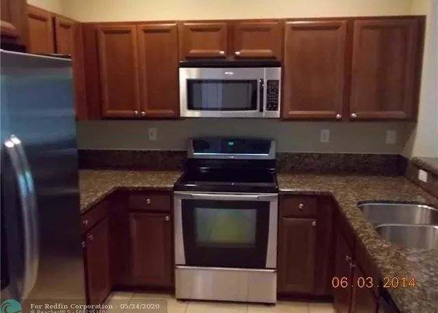 $370,000 | 21205 Northwest 14th Place, Unit 319, Miami, FL 33169