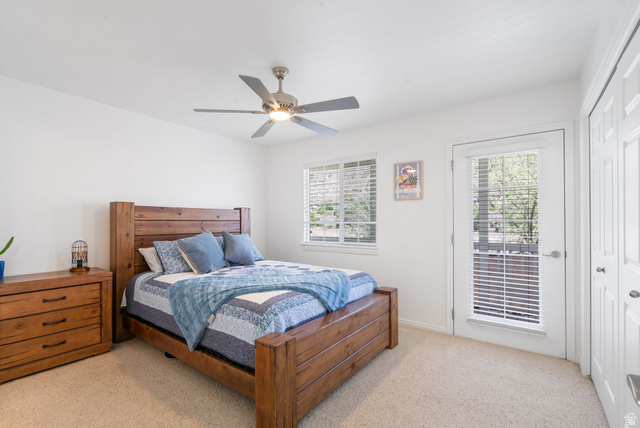 732 North 200 E Street Springville, UT 84663 - Photo 5 of 36 Well-lit room featuring neutral wall paint, light-toned carpeting, and a ceiling fan with integrated lighting