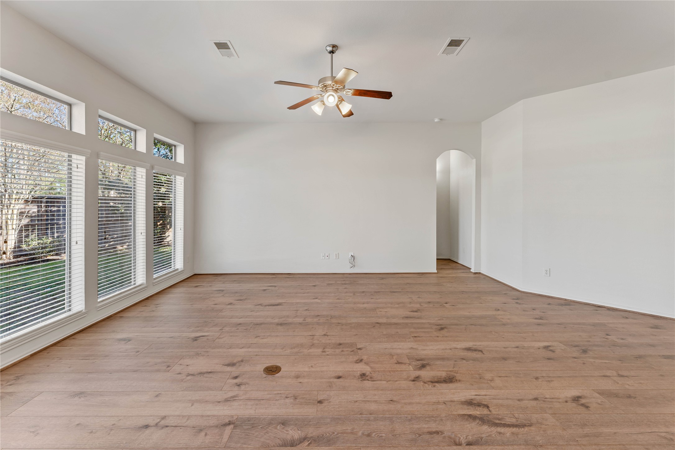 1602 Eden Meadows Drive Spring, TX 77386 - Photo 21 of 42 a view of a livingroom with a ceiling fan and window