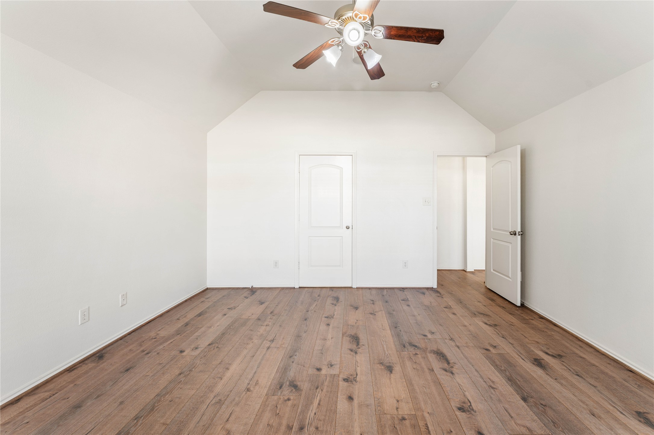 1602 Eden Meadows Drive Spring, TX 77386 - Photo 23 of 42 an empty room with wooden floor closet and windows