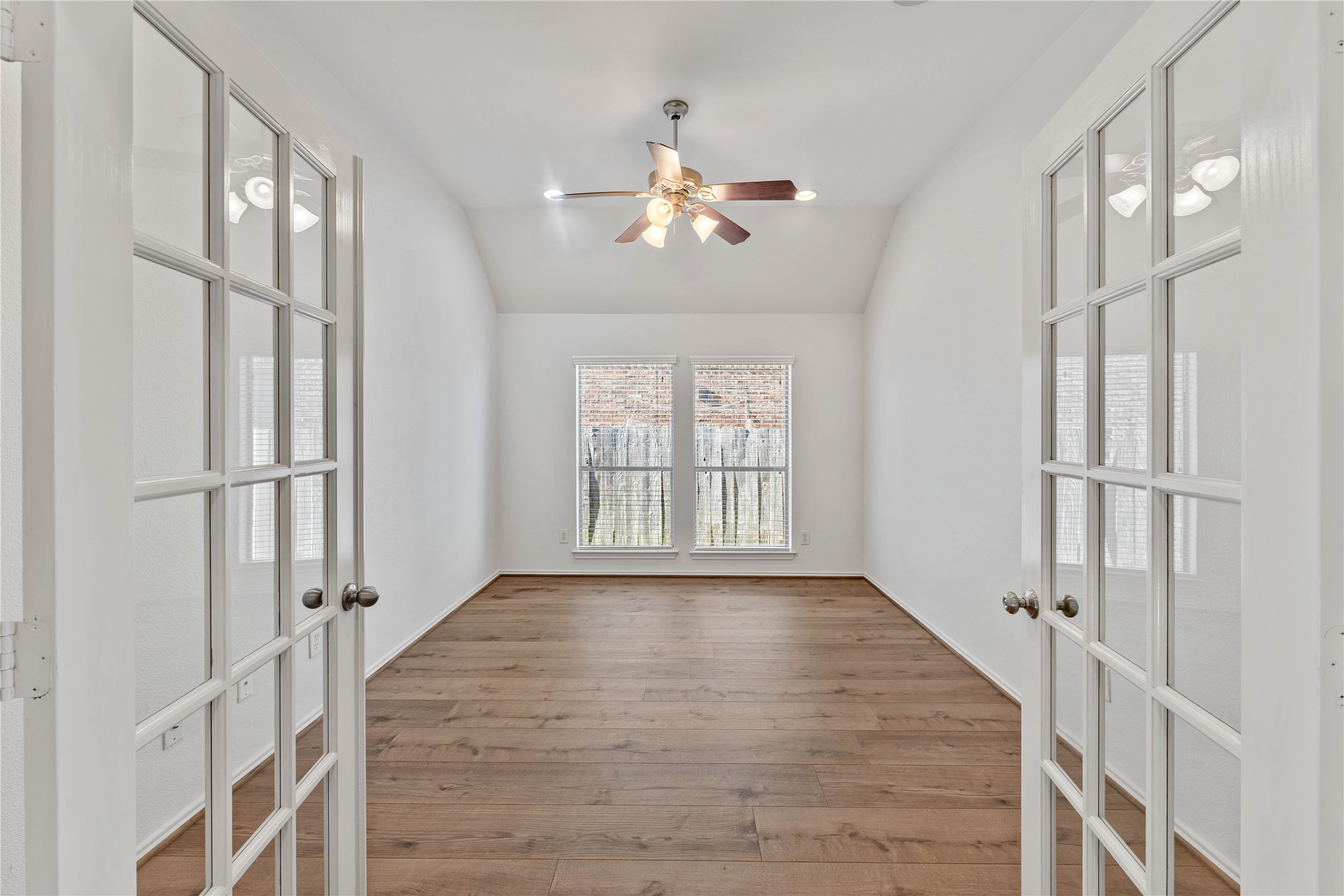 1602 Eden Meadows Drive Spring, TX 77386 - Photo 5 of 42 wooden floor in an empty room with a window
