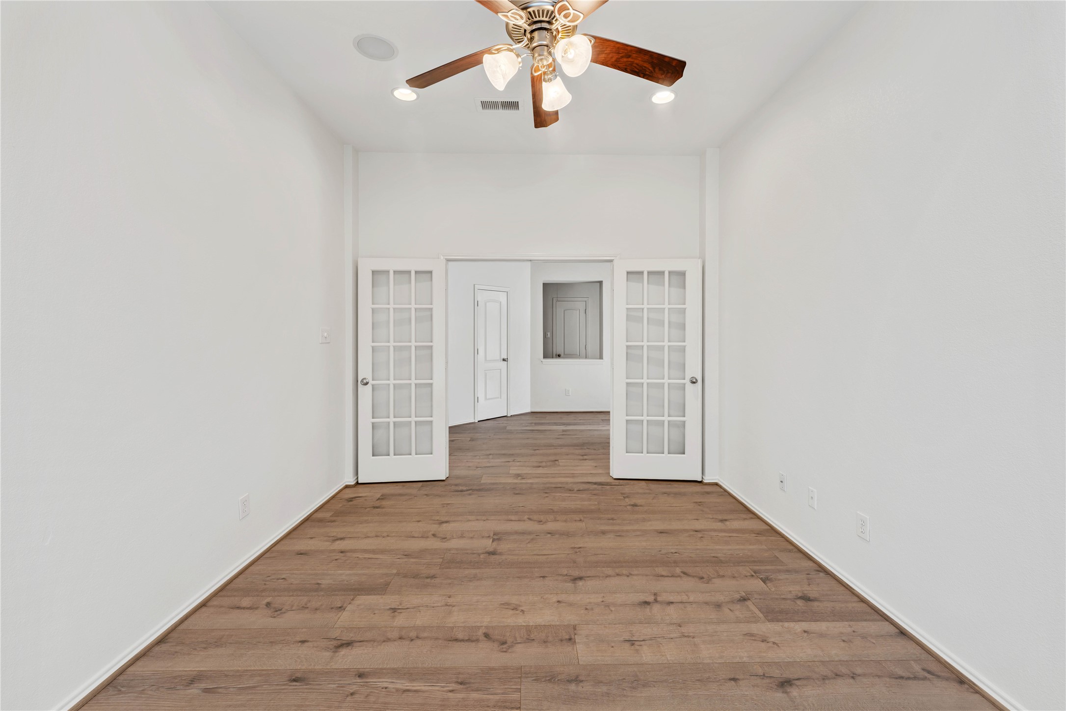 1602 Eden Meadows Drive Spring, TX 77386 - Photo 6 of 42 wooden floor in an empty room