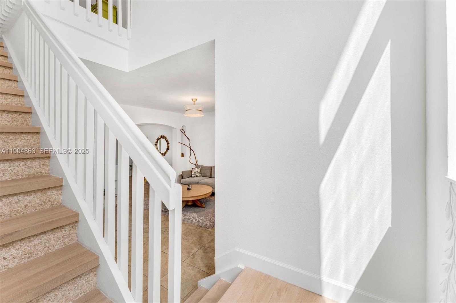 17080 Southwest 92nd Court Palmetto Bay, FL 33157 - Photo 16 of 40 a view of a hallway with staircase