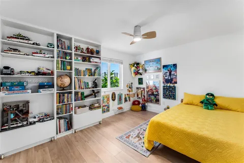 a bedroom with a bed and closet