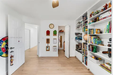 a view of an empty room with shelves