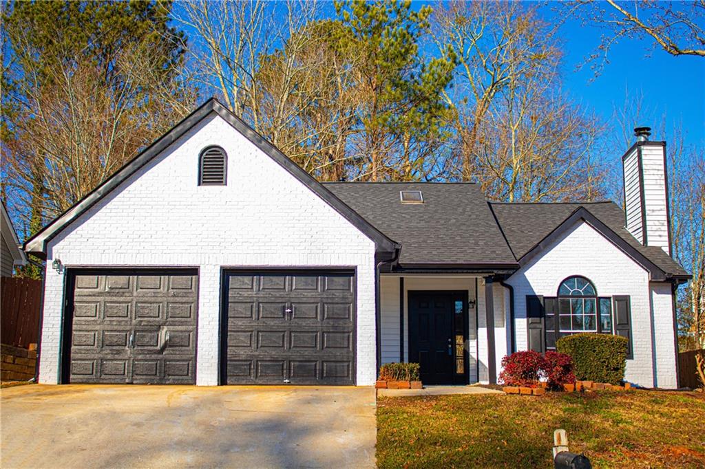 3819 Landgraf Cove Decatur, GA 30034 - Photo 1 of 1 a view of a house with a yard