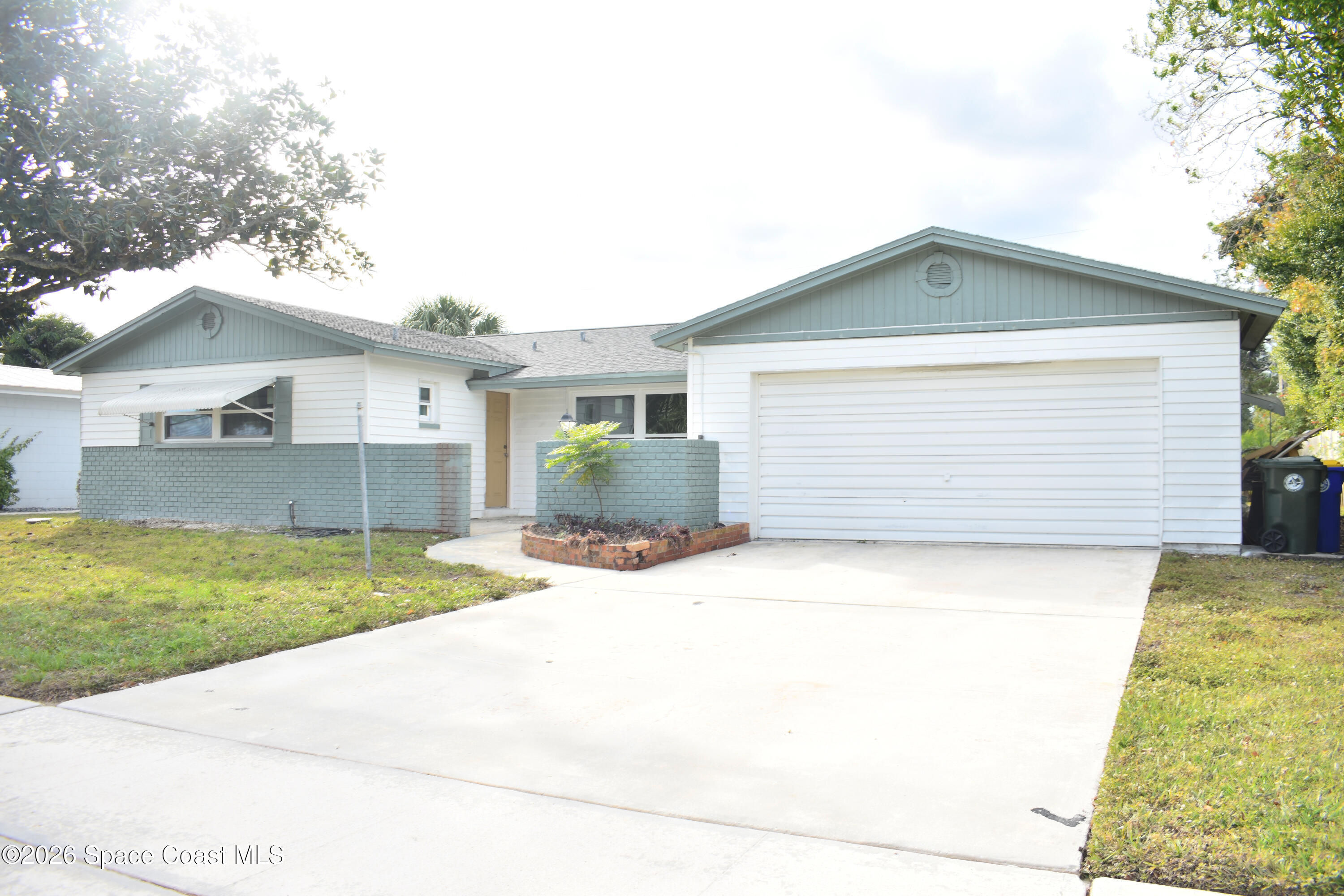 1413 Floyd Drive Rockledge, FL 32955 - Photo 2 of 20 1) 66576-695db13783f1e