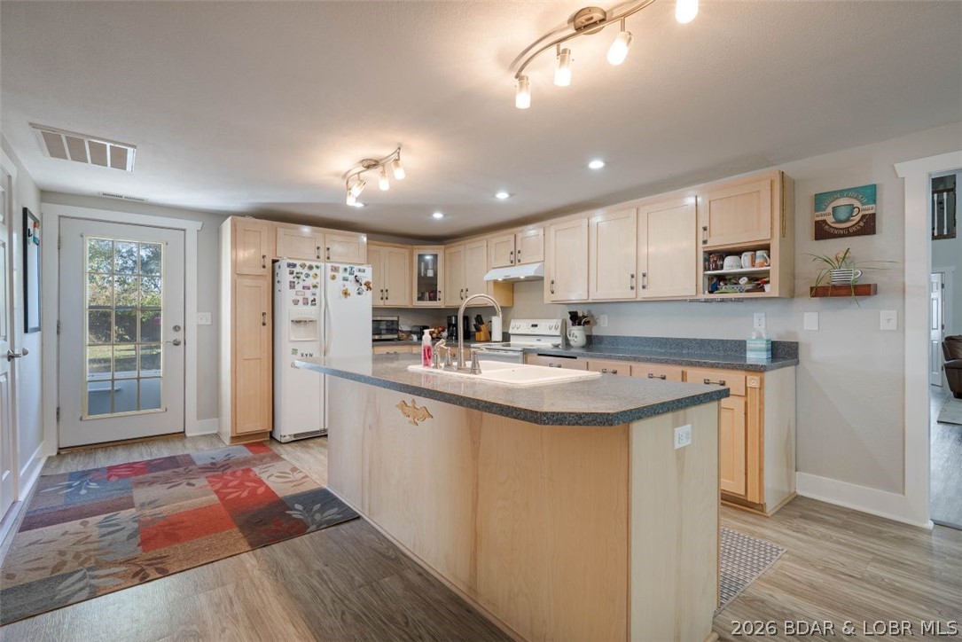 406 South Godfrey Avenue Eldon, MO 65026 - Photo 13 of 66 Expansive kitchen with new flooring.