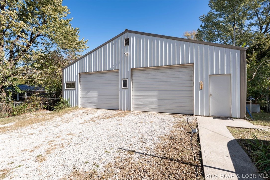 406 South Godfrey Avenue Eldon, MO 65026 - Photo 2 of 66 Metal building w/9' doors and 2500 sq ft.