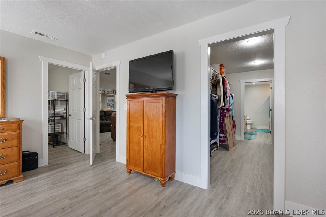 406 South Godfrey Avenue Eldon, MO 65026 - Photo 22 of 66 Expansive primary bedroom and walk in closet.