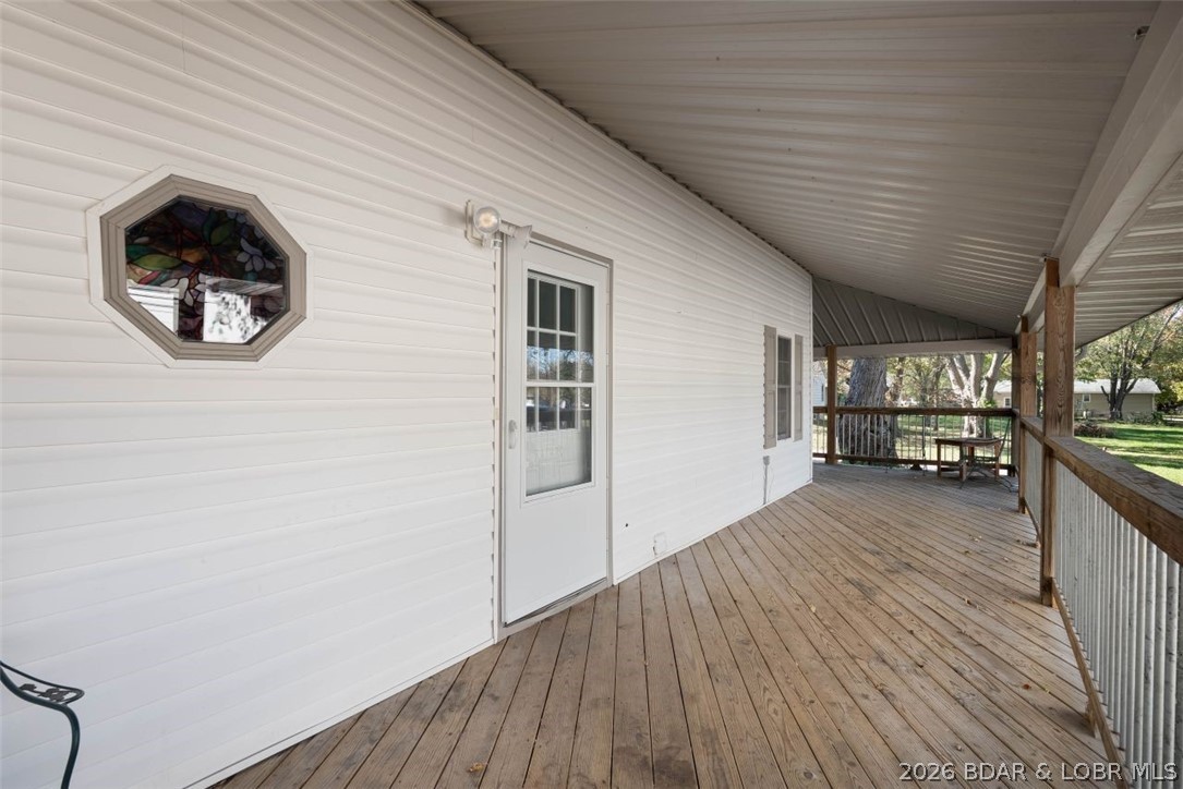 406 South Godfrey Avenue Eldon, MO 65026 - Photo 46 of 66 Front entry covered deck.