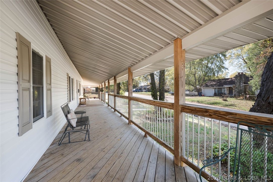 406 South Godfrey Avenue Eldon, MO 65026 - Photo 47 of 66 Front of the wrap around deck.