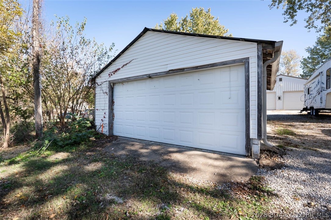 406 South Godfrey Avenue Eldon, MO 65026 - Photo 54 of 66 Two car garage at the street entrance.