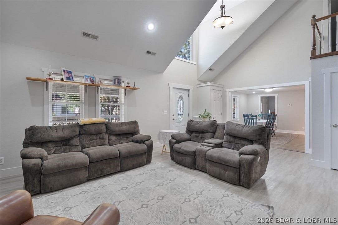 406 South Godfrey Avenue Eldon, MO 65026 - Photo 6 of 66 View of the living room vaulted ceiling and new fl