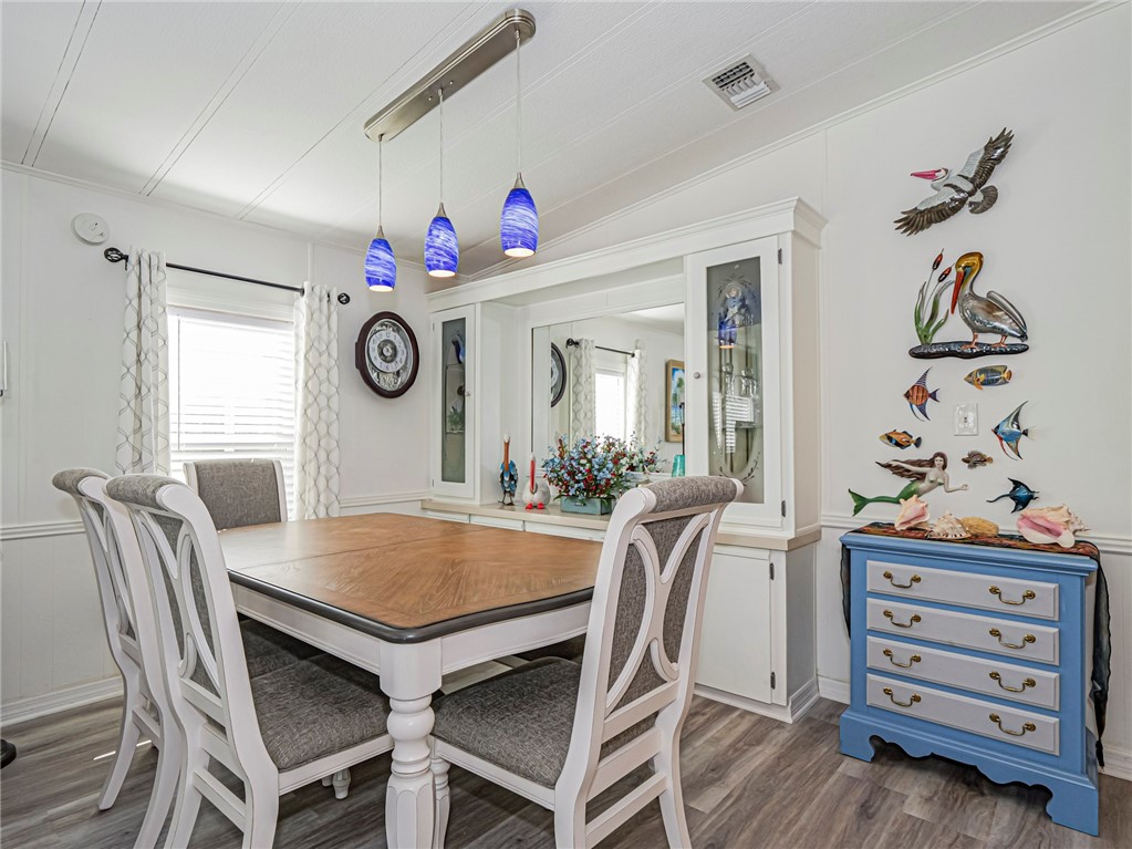 409 Avocado Drive Sebastian, FL 32976 - Photo 11 of 35 a view of a dining room with furniture and a table