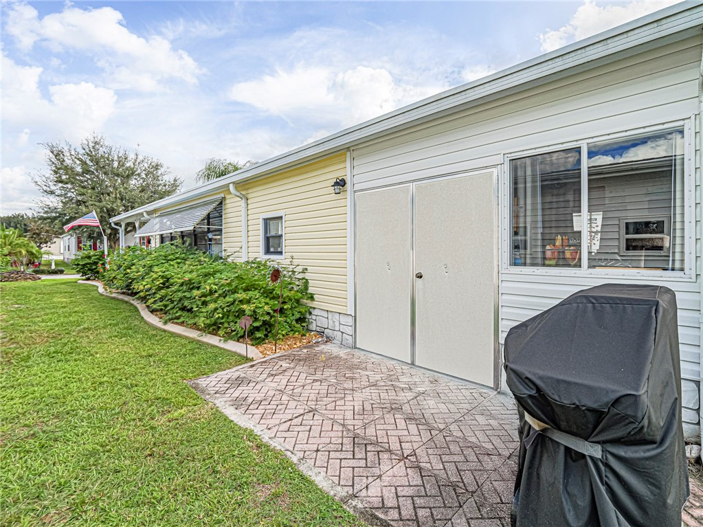 409 Avocado Drive Sebastian, FL 32976 - Photo 34 of 35 a front view of a house with garden