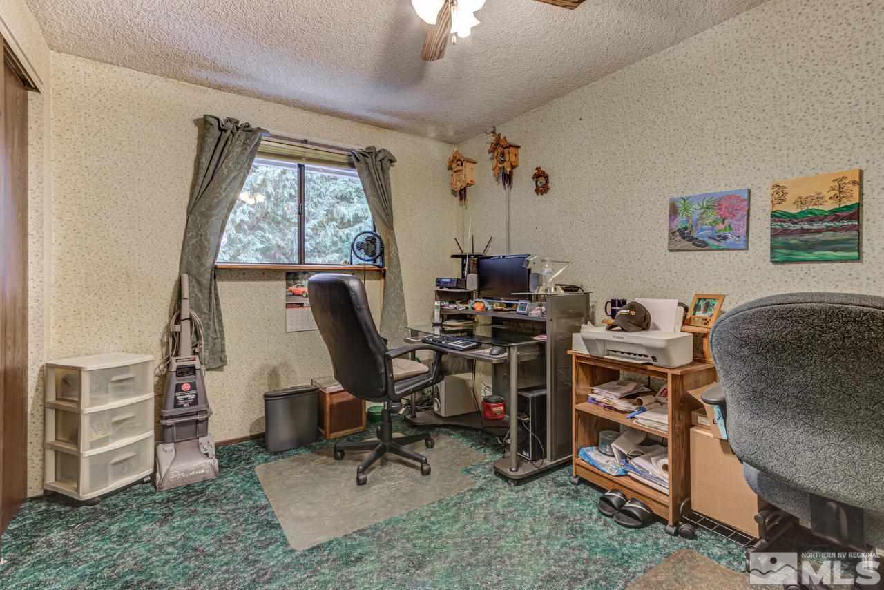 1985 Mayberry Drive Reno, NV 89509 - Photo 14 of 21 a view of a workspace with furniture and a window