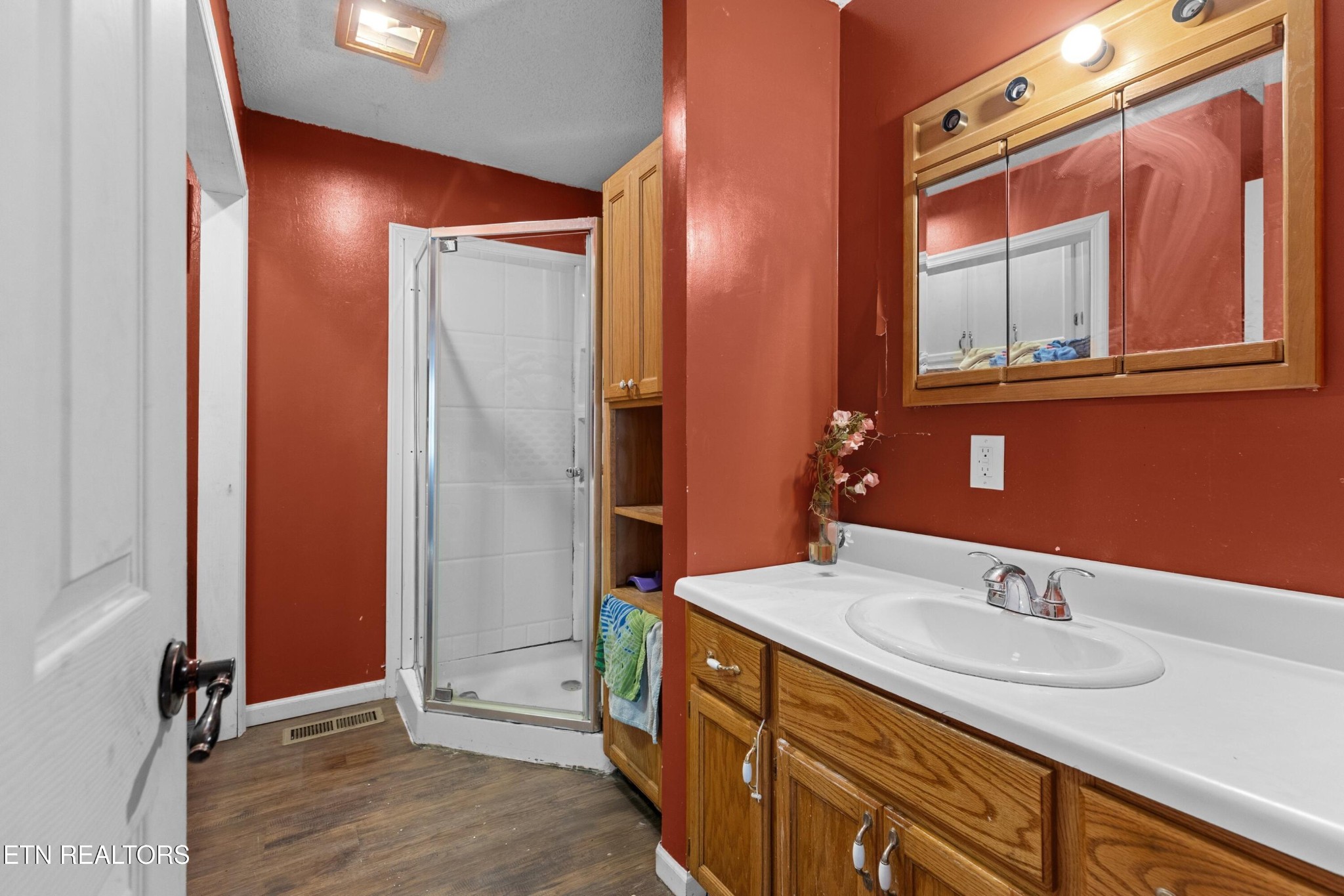 630 South Proctor Boulevard Oneida, TN 37841 - Photo 21 of 32 a bathroom with a sink and a mirror