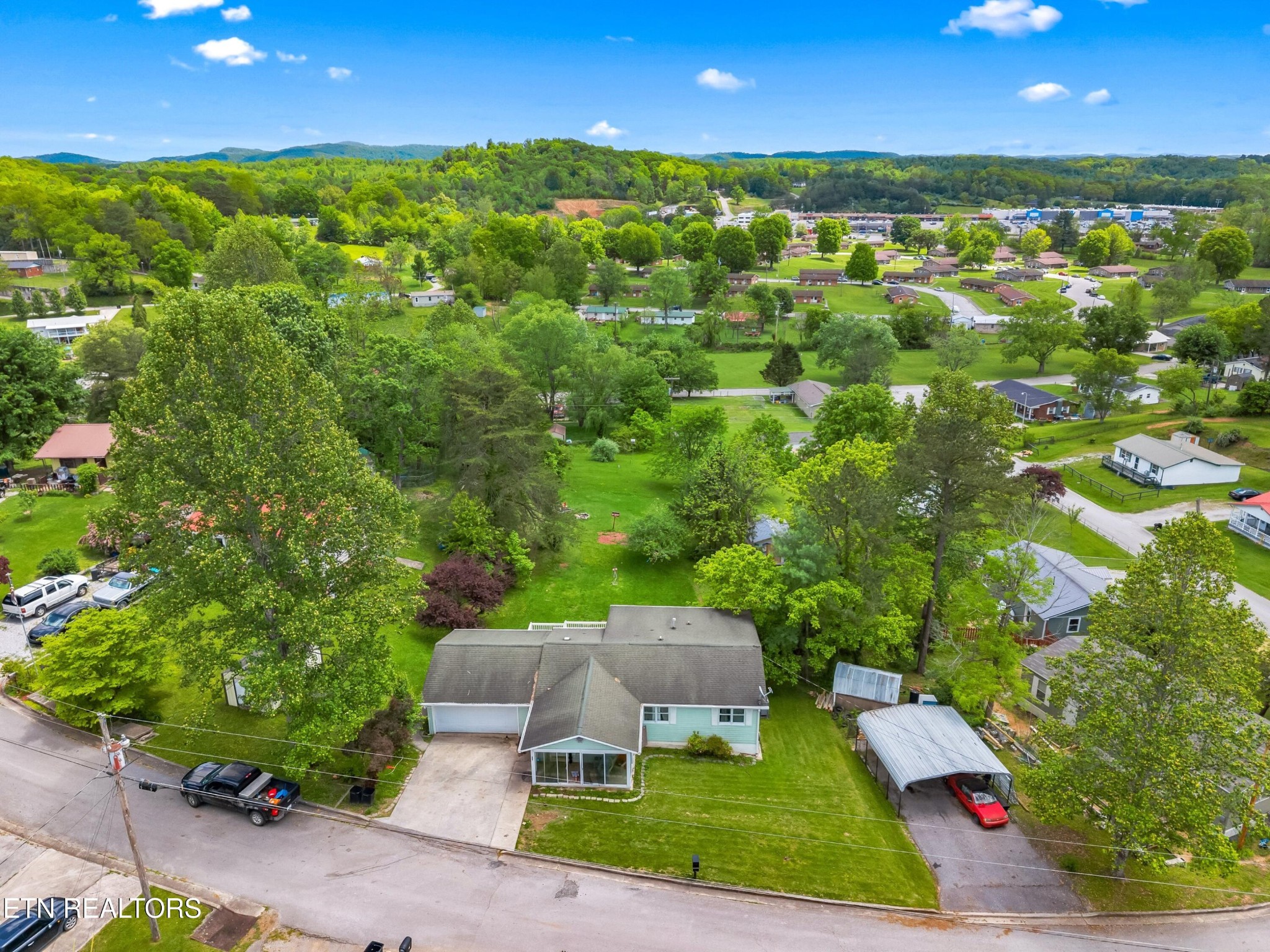 630 South Proctor Boulevard Oneida, TN 37841 - Photo 31 of 32 an aerial view of a house with a yard