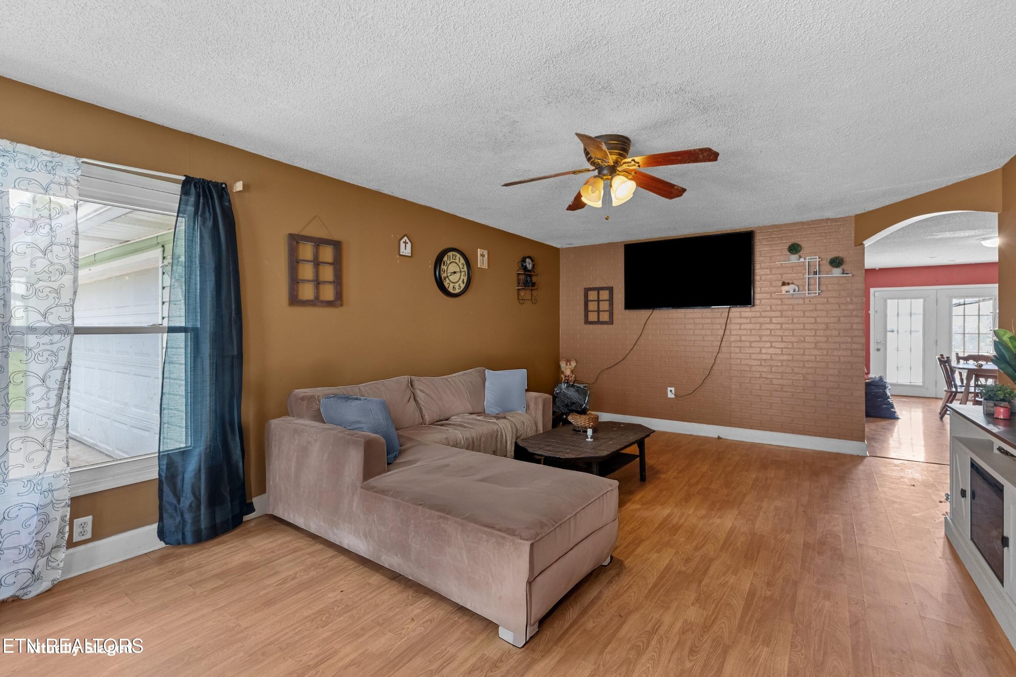 630 South Proctor Boulevard Oneida, TN 37841 - Photo 7 of 32 a living room with furniture and a flat screen tv