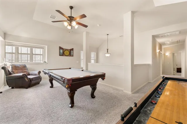 a room with furniture and a large window