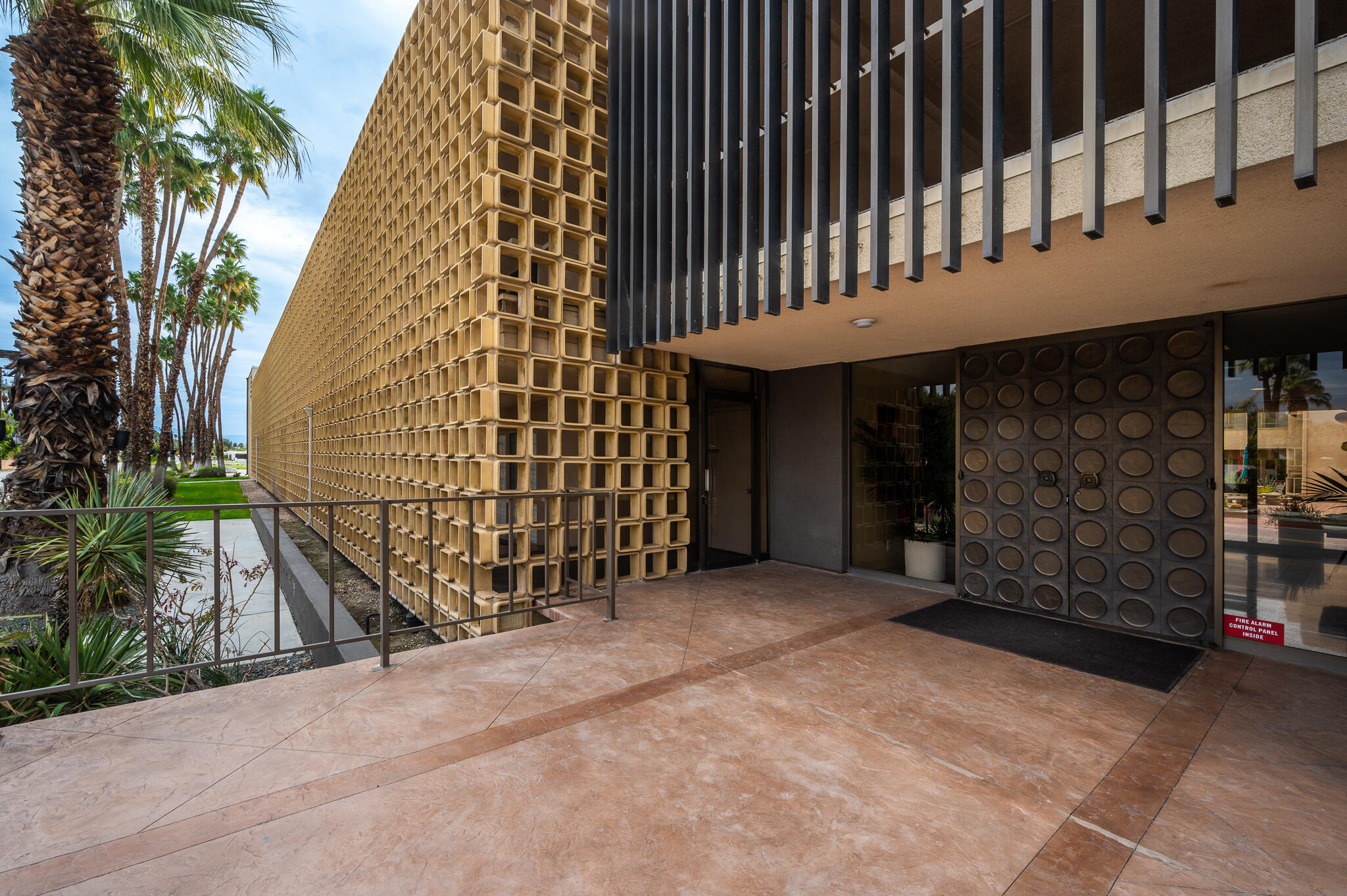 277 East Alejo Road, Unit 113 Palm Springs, CA 92262 - Photo 18 of 27 a view of a entrance gate of a building