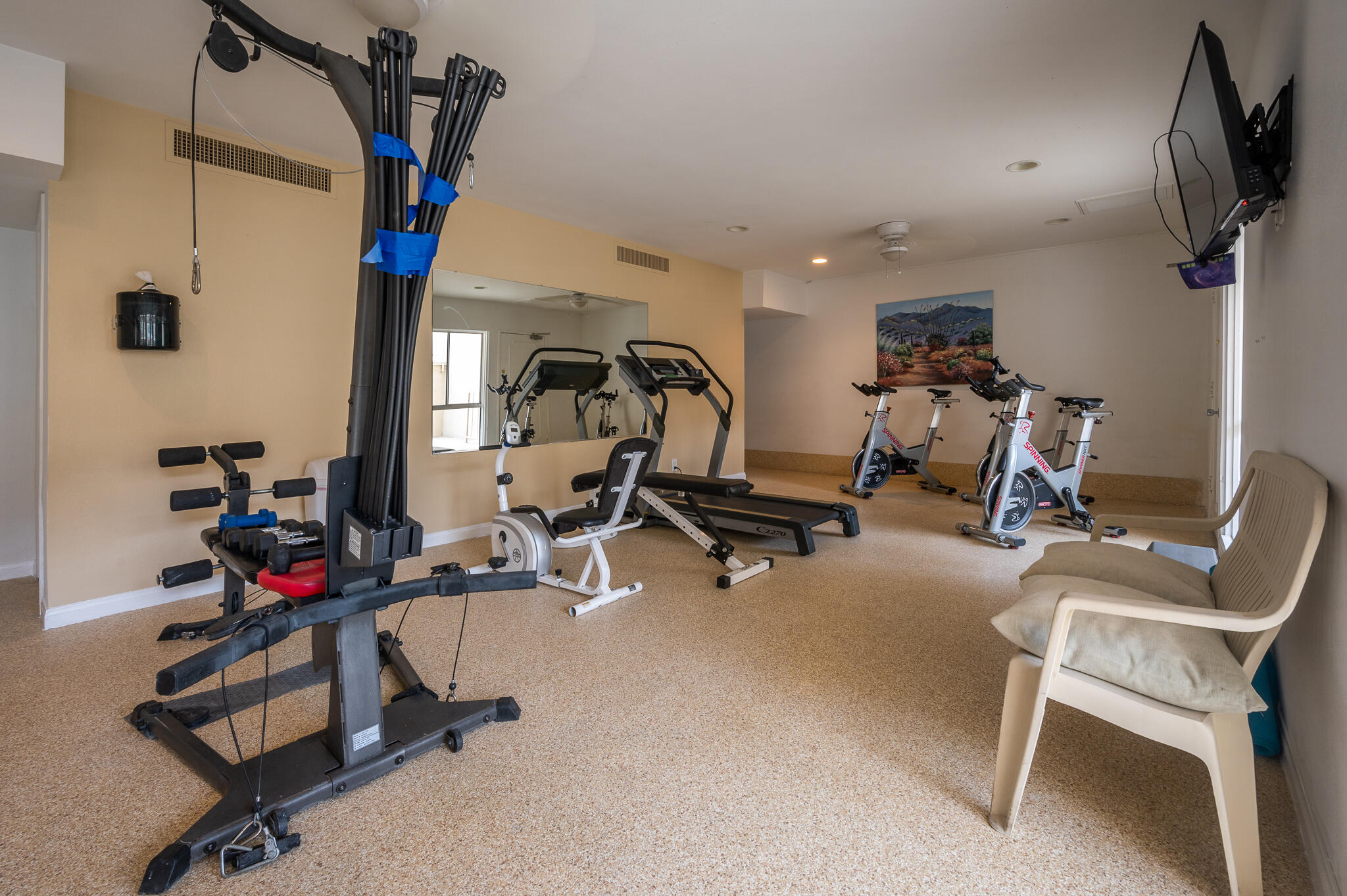 277 East Alejo Road, Unit 113 Palm Springs, CA 92262 - Photo 25 of 27 a view of a room with gym equipment