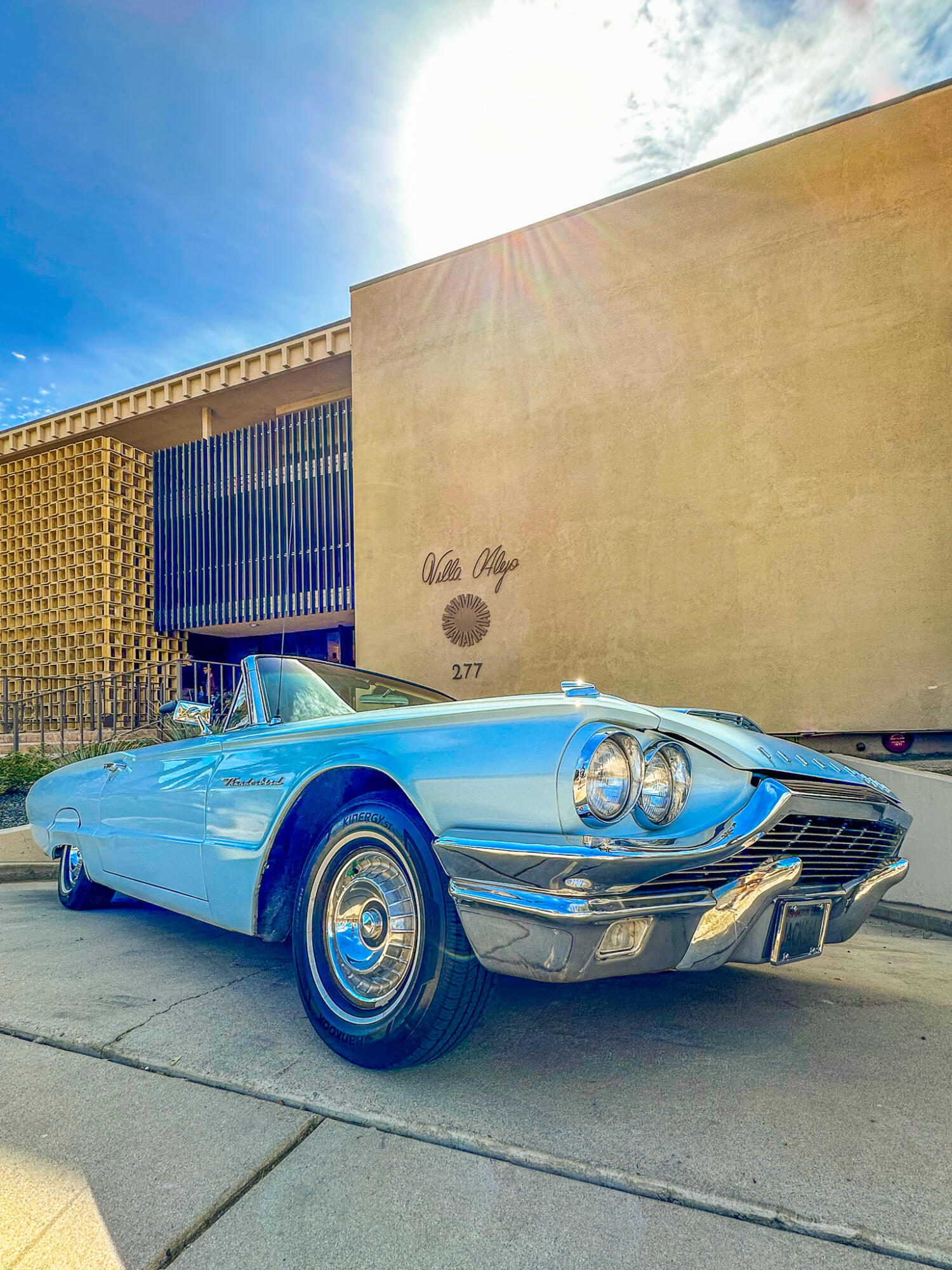 277 East Alejo Road, Unit 113 Palm Springs, CA 92262 - Photo 5 of 27 a car parked on the side of a building