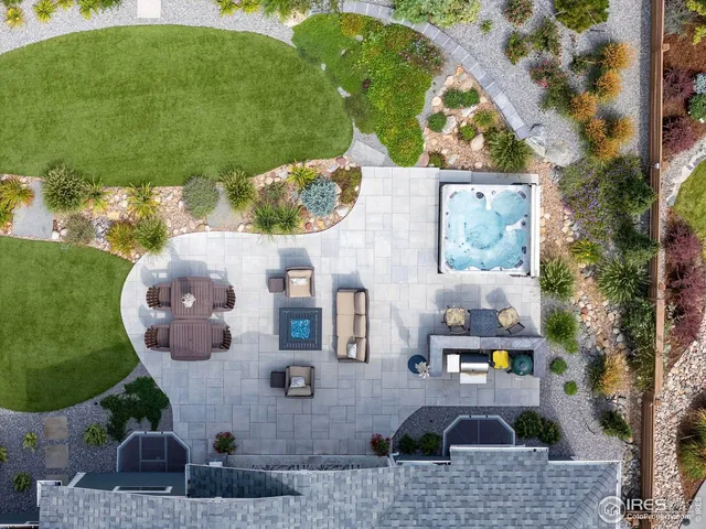 an aerial view of a swimming pool and outdoor space